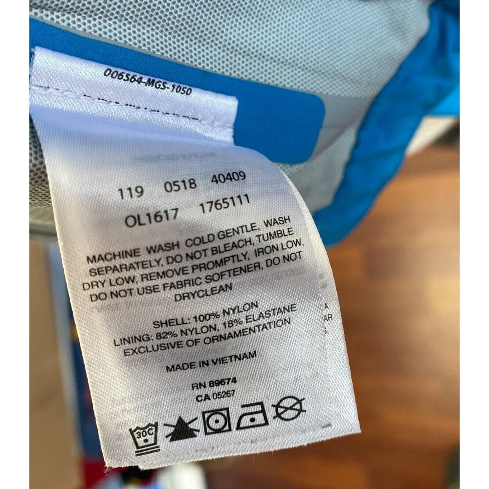 Mountain Hard Wear Rain Jacket Woman XS Aqua Blue Hood Zip Nylon Pockets Outdoor